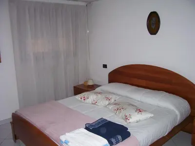 Letto o letti in una camera di Miniappartamento Il Gelsomino