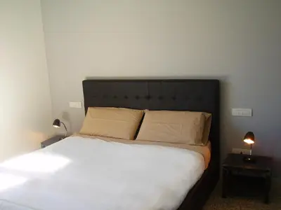 Letto o letti in una camera di B&B La Porta Rossa