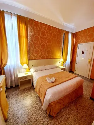 Letto o letti in una camera di Hotel Corte dei Greci