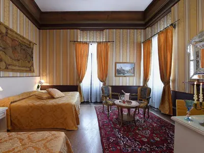 Letto o letti in una camera di Hotel Corte dei Greci
