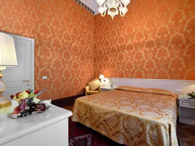 Letto o letti in una camera di Hotel Corte dei Greci