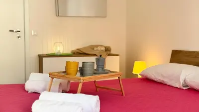 Letto o letti in una camera di Appartamento Madagascar by Ca-Sa Check