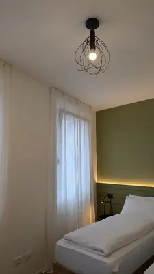 Letto o letti in una camera di Pilo2Home