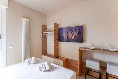 Letto o letti in una camera di GuestHost - Padova Cozy Studio near the Hospital!