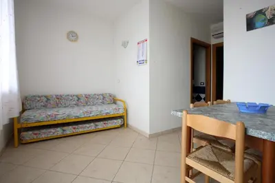 Letto o letti in una camera di Elsa 2 camere da letto vista spiaggia