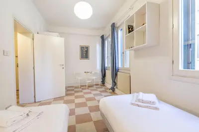 Letto o letti in una camera di Santa Lucia Canal View by Wonderful Italy
