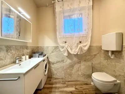 Bagno di Villaggio Lido - Carraro Immobiliare - Family Apartments