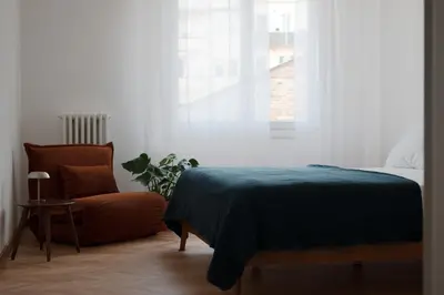 Letto o letti in una camera di Brique apartment