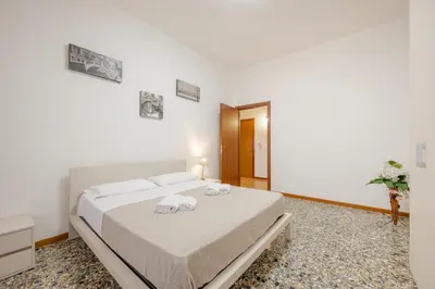 Letto o letti in una camera di Tatiana Flat - 10 minutes to Venice - Mestre Train Station - Free Parking