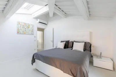 Letto o letti in una camera di The White House - business and charme