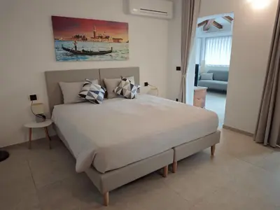 Letto o letti in una camera di Casa Re Del Bosco - Venice Airport