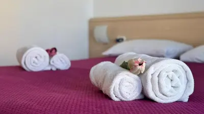 Letto o letti in una camera di Il Giardino delle farfalle by Ca-Sa Check