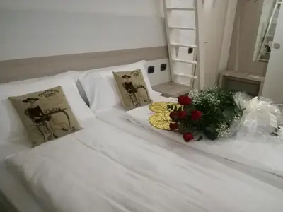 Letto o letti in una camera di B&B Nuova Ostiglia