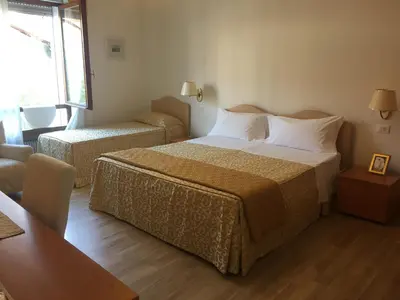 Letto o letti in una camera di Residenza Giacomuzzi