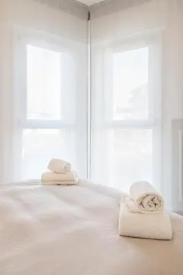 Letto o letti in una camera di Bixio Living