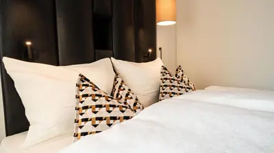 Letto o letti in una camera di Relais Santa Lucia - Appartamenti Luxury e Premium
