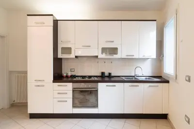Cucina o angolo cottura di enJoy Home - Appartamento Carducci