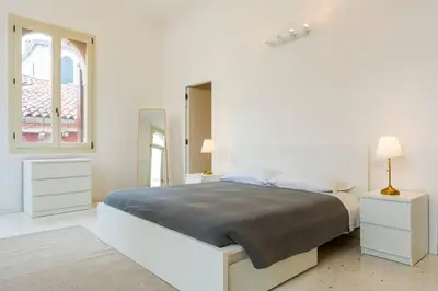Letto o letti in una camera di San Felice Elegant by Sarlux