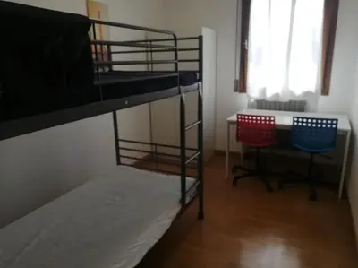 Letto o letti in una camera di Home Puppy