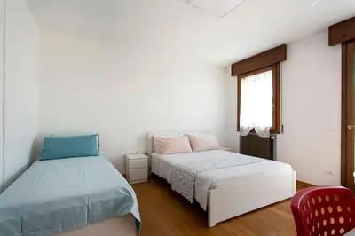 Letto o letti in una camera di Home Puppy