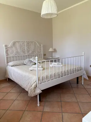 Letto o letti in una camera di La Brentella
