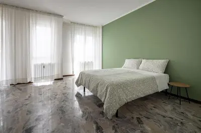 Letto o letti in una camera di Casa Genny