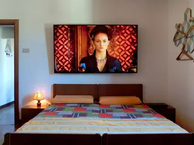 Letto o letti in una camera di Luce Fantasia e TV 70p a 2 minuti dalla spiaggia