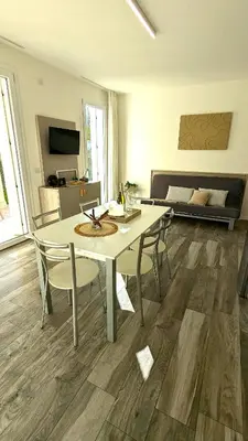 TV o dispositivi per l'intrattenimento presso Mazzini Green Suites Jesolo