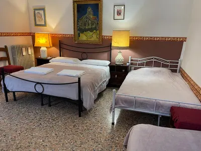 Letto o letti in una camera di Residence Fortuny Princessclass