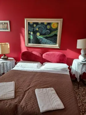 Letto o letti in una camera di Residence Fortuny Princessclass