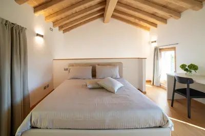 Letto o letti in una camera di Casa Capitania