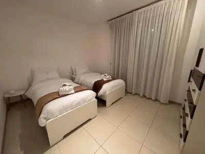 Letto o letti in una camera di DB Apartments - Il Rifugio