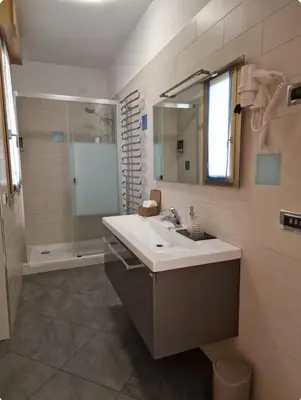 Bagno di DB Apartments - Il Rifugio