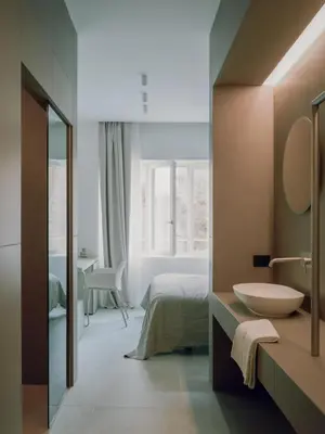 Letto o letti in una camera di Santa Lucia Suites