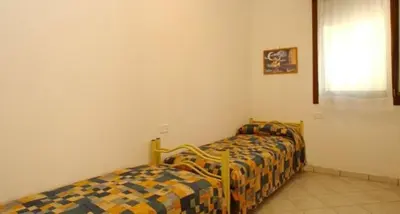Letto o letti in una camera di Comfy flat in Rosolina with shared pool