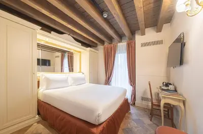 Letto o letti in una camera di Hotel Villa Barbarich