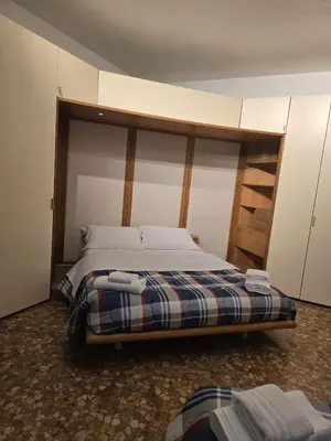 Letto o letti in una camera di MMM HOME Train Station 4