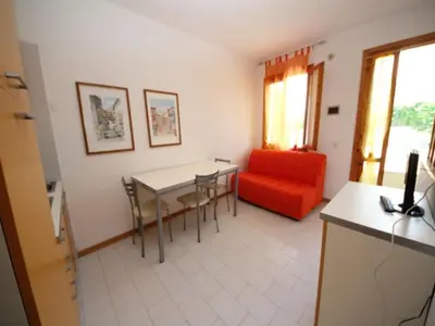 Cucina o angolo cottura di Enjoy our flat with garden in Rosolina
