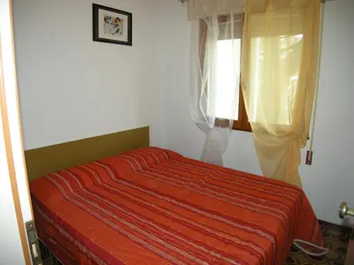 Letto o letti in una camera di Cozy apartment close to the beach