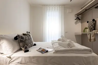Letto o letti in una camera di Residence Canova