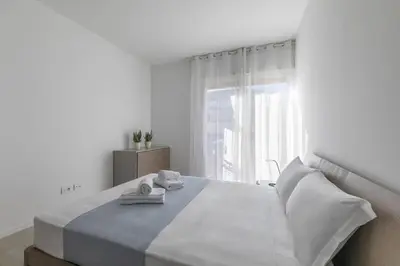 Letto o letti in una camera di Ca' Milla 2 by WelcHome