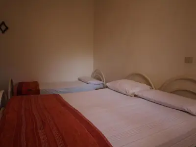 Letto o letti in una camera di Comfy flat in a quiet area of Rosolina