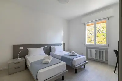 Letto o letti in una camera di Ca' Milla 1 by WelcHome