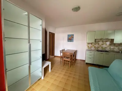 Cucina o angolo cottura di Flat with shared garden 200 mt from the sea