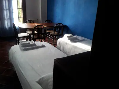 Letto o letti in una camera di B&B Il Centralino