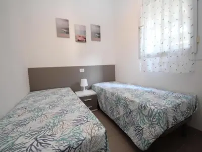 Letto o letti in una camera di Modern flat located in Rosolina near the sea