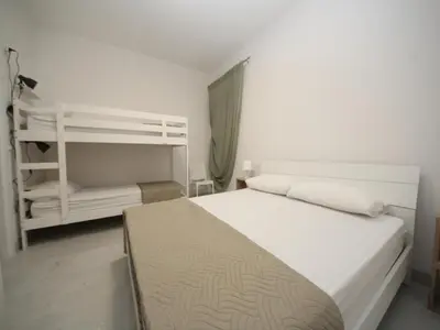 Letto o letti in una camera di Modern apartment near the beach