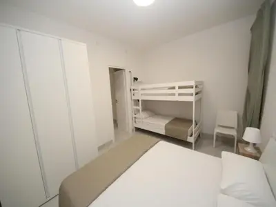 Letto o letti in una camera di Modern apartment near the beach