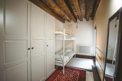 Letto o letti in una camera di Raphael's Garden House