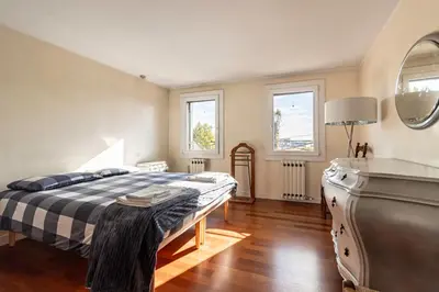 Letto o letti in una camera di GuestHost - Affaccio sul Brenta - bright apartment in Oriago